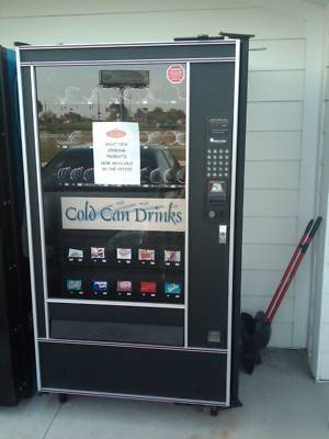 Used api snack and cold drink vending machine 
